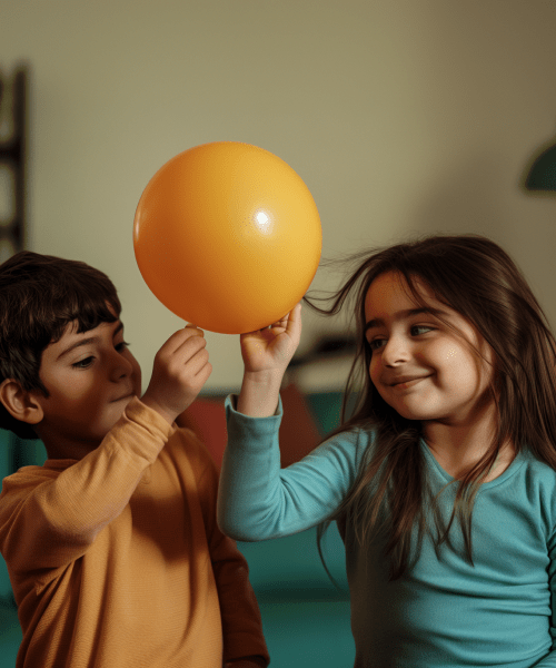 Children playing with a balloon