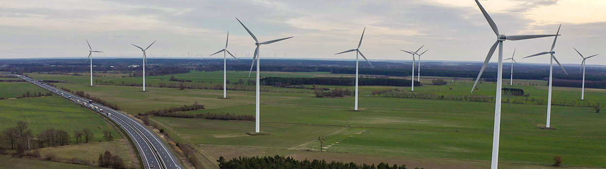 Wind turbines along a country road