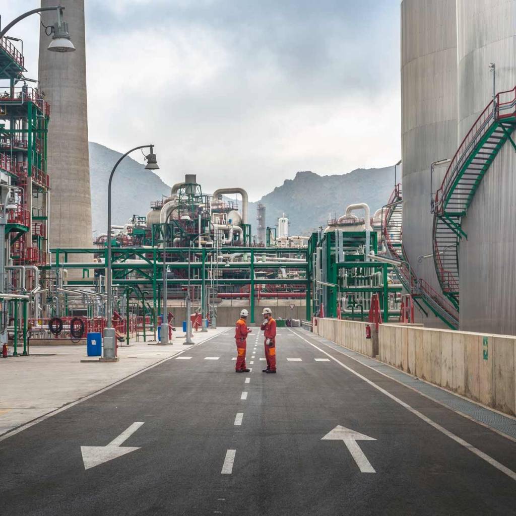 Road with operators in an industrial complex