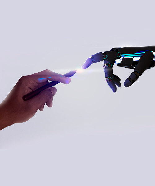 La mano de persona se junta con la de una máquina en señal de unión entre lo virtual y lo real