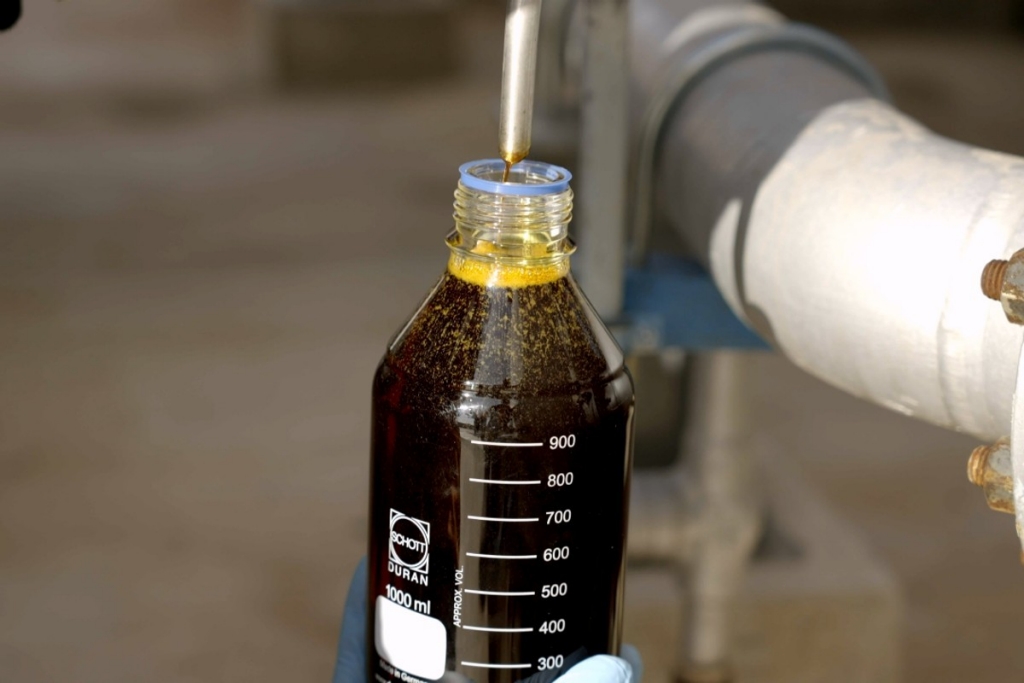 Muestra viscosa en botella