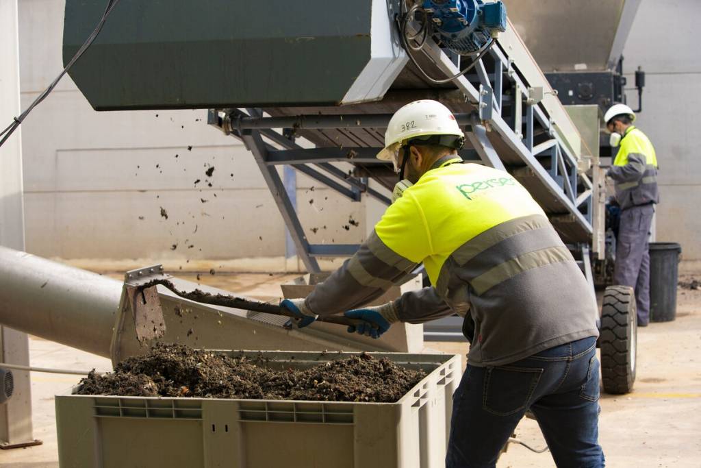 Perseo personnel working in waste management