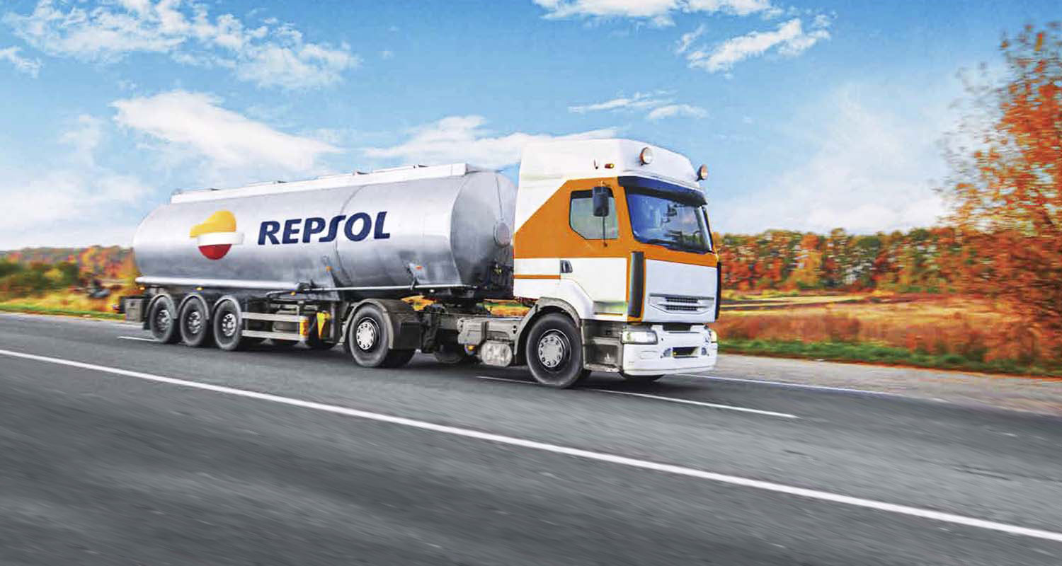 Repsol fuel truck driving on the road
