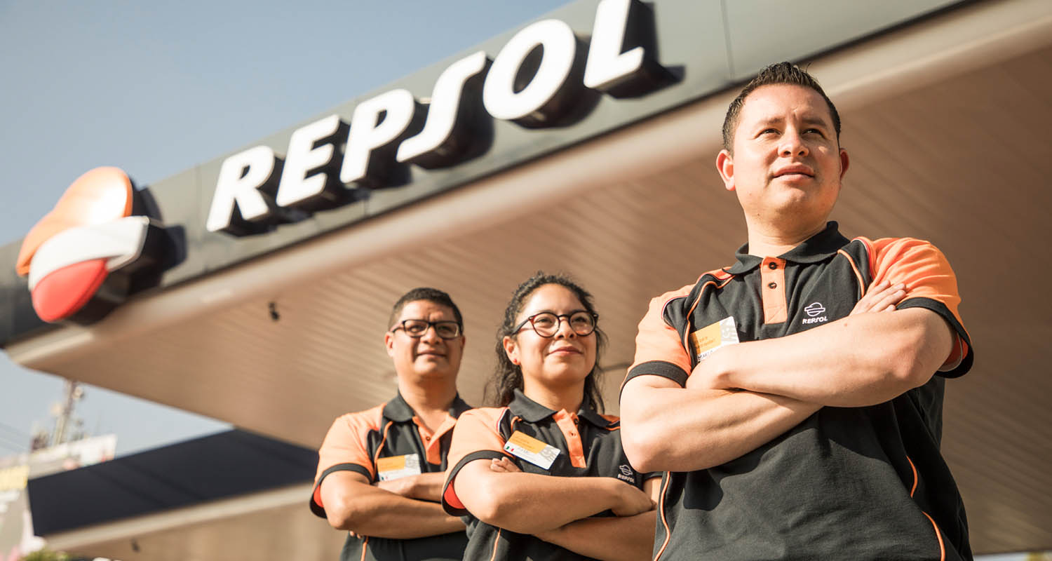 Side of a service station with Repsol logo
